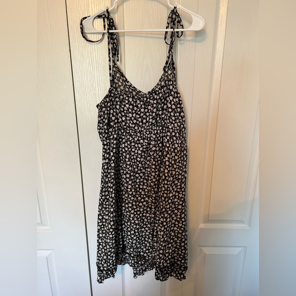 Summer Dress with adjustable ties on the shoulders. Black flowers. Never worn